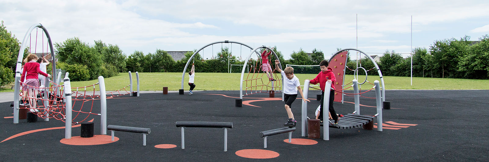 A circular obstacle course in a middle of a school playground.